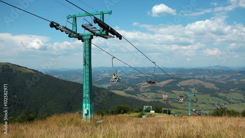 4K Timelapse of people on cable road in carpathian mountains in Ukraine. Video without birds and defects photo