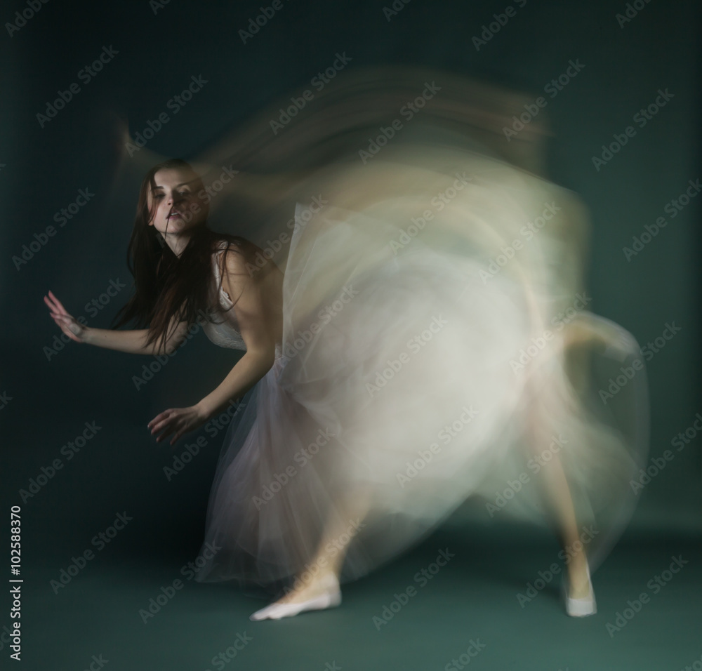 Naklejka premium Ballet dancer woman in motion blur, ballerina