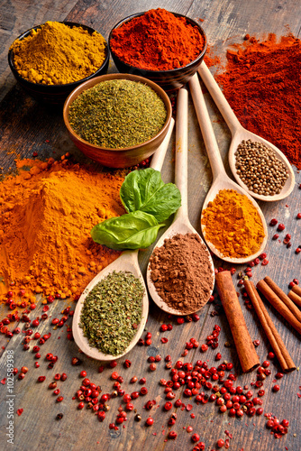 Fototapeta Naklejka Na Ścianę i Meble -  Variety of spices on kitchen table