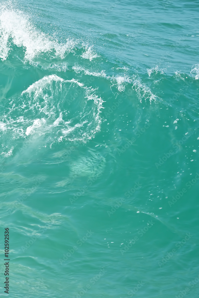 Turquoise water splash vertical image Turquoise water splash vertical image
