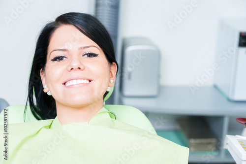 Young woman patient smiling cute at dentist