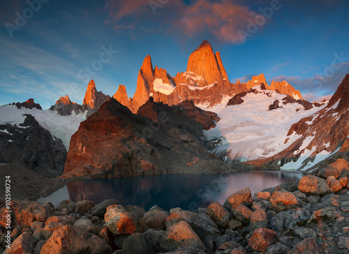 Fototapeta Naklejka Na Ścianę i Meble -  Mount Fitz Roy in the red light of sunrise. Patagonia. Argentina.