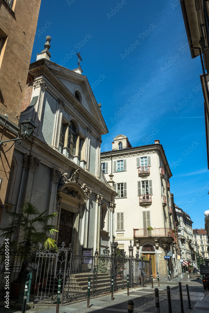 Fototapeta premium Houses and church in the Quadrilatero, Turin, Italy