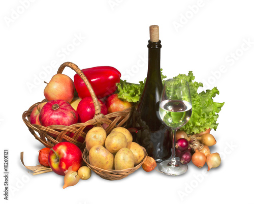 Fototapeta Naklejka Na Ścianę i Meble -  Group of fruits, vegetables and greenery with bottle and wicker