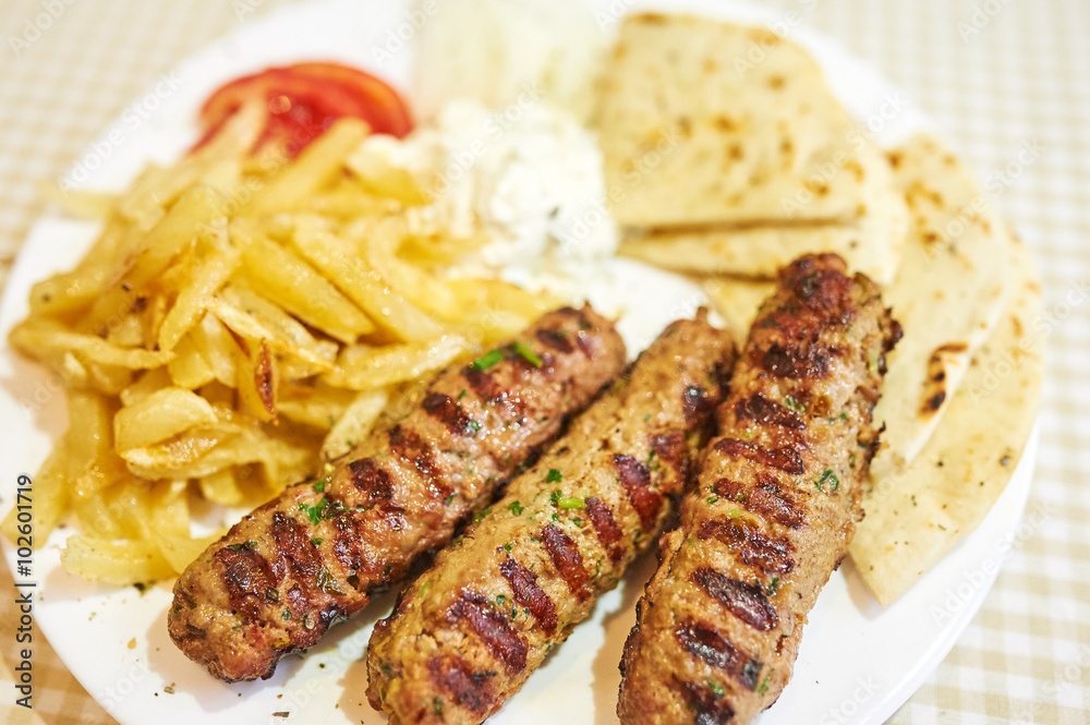 Grilled sausages with fries, barbecue