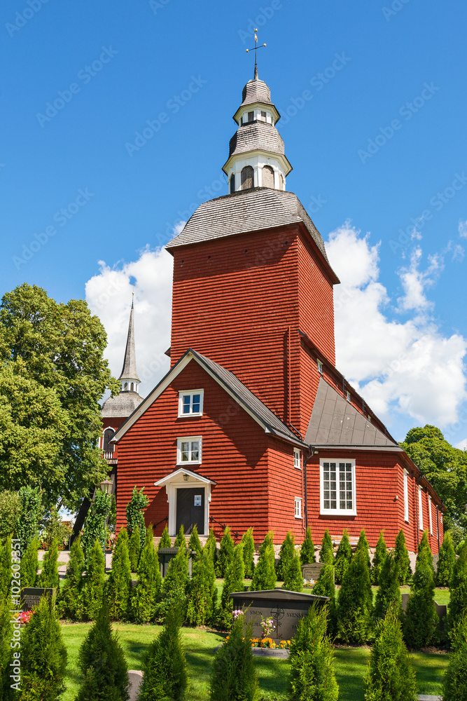 Rural red Wooden Church in summer