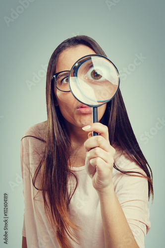 Geek with a magnifying glass