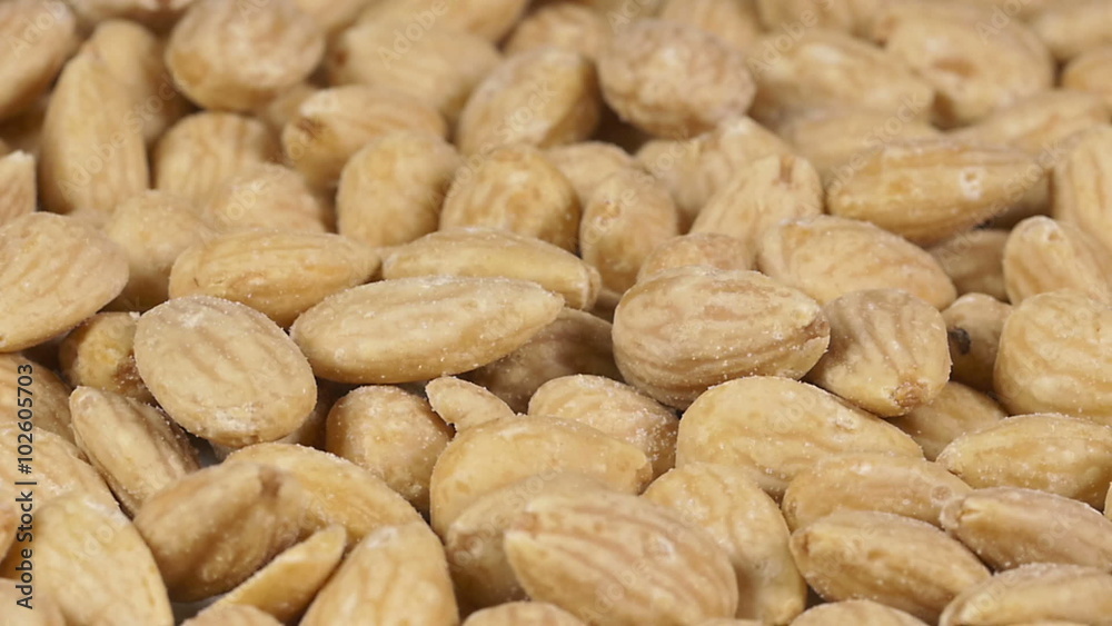 Close-up of almonds on a rotating plate Close-up of almonds on a rotating plate