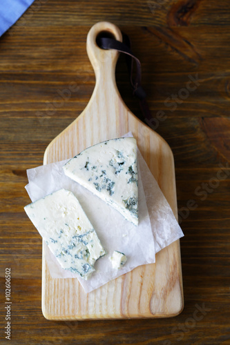 piece of blue cheese on board
