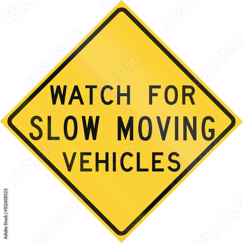 Road sign used in the US state of Texas - Watch for slow moving vehicles