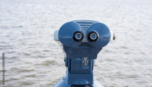 binoculars for rent at the border of the lake