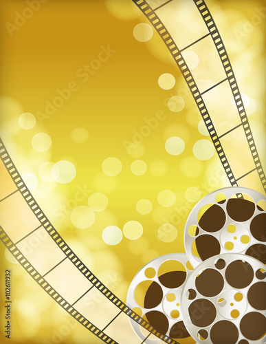 cinema golden background with retro filmstrip, film reel