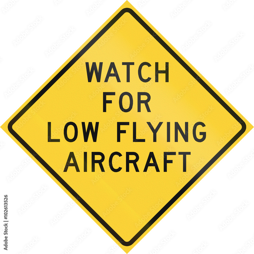 Road sign used in the US state of Texas - Watch for low flying aircraft Road sign used in the US state of Texas - Watch for low flying aircraft