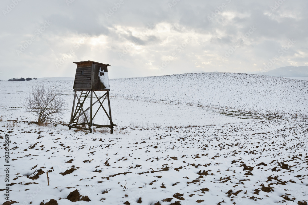 Hunting lookout tower in the fields of northern Slovakia. Hunting lookout tower in the fields of northern Slovakia.