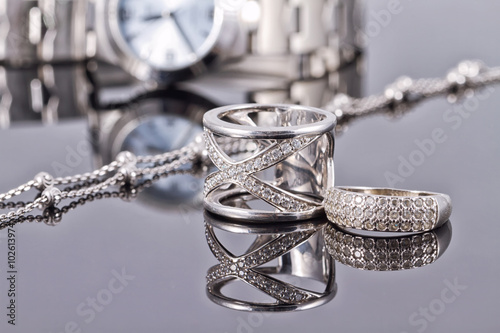 Elegant ring made of silver and silver chain and women's watches