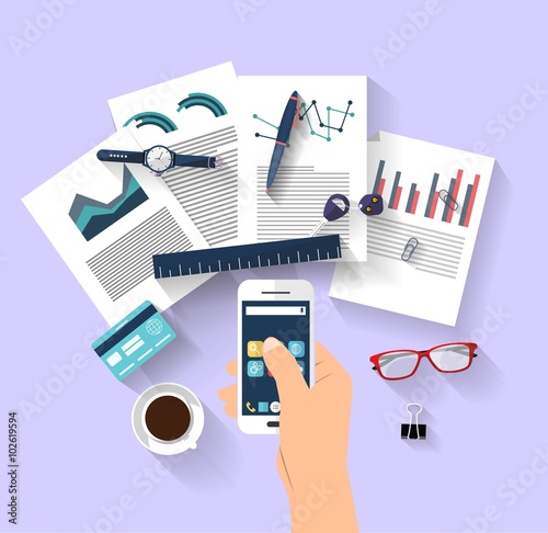 Work concept - business concept - flat design - top view - big ideas - bright ideas A human's hands holding a smart-phone that shown some business charts. Many objects (smart-phone, pens, papers.....)