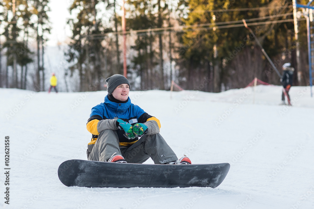 snowboarder walking in a winter day snowboarder walking in a winter day
