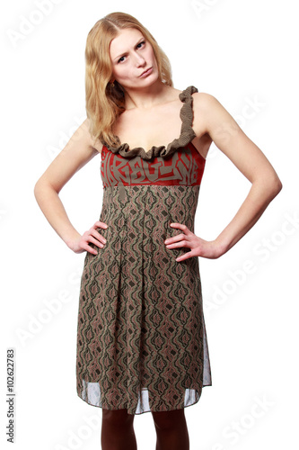 Young blonde nasty woman looking discontentedly, isolated on white background