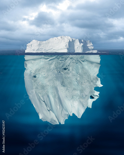 Mostly Underwater Iceberg Floating in Ocean