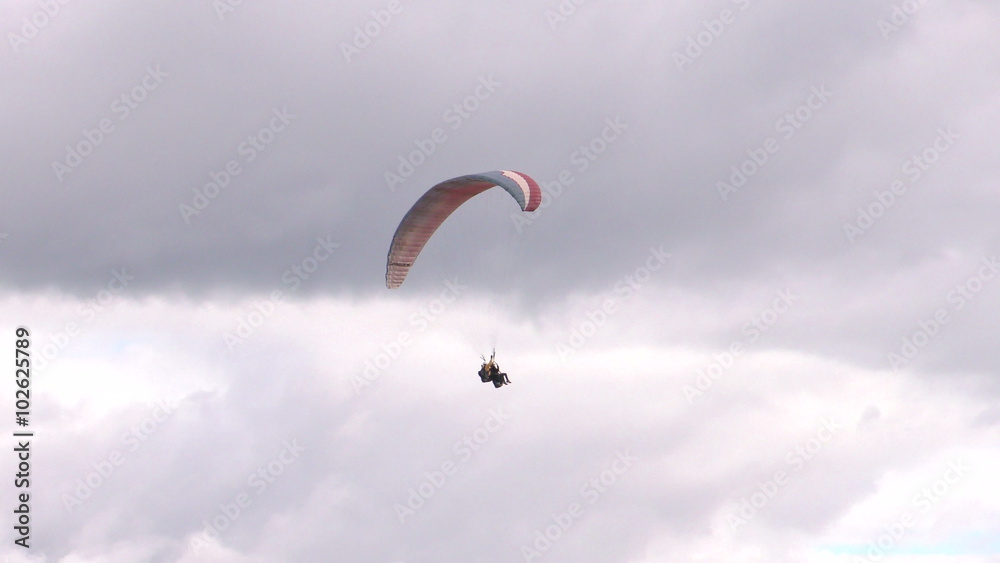 Experience the thrill of a tandem paragliding flight against the breathtaking backdrop of Tungurahua volcano crater in Ecuador. Experience the thrill of a tandem paragliding flight against the breathtaking backdrop of Tungurahua volcano crater in Ecuador.