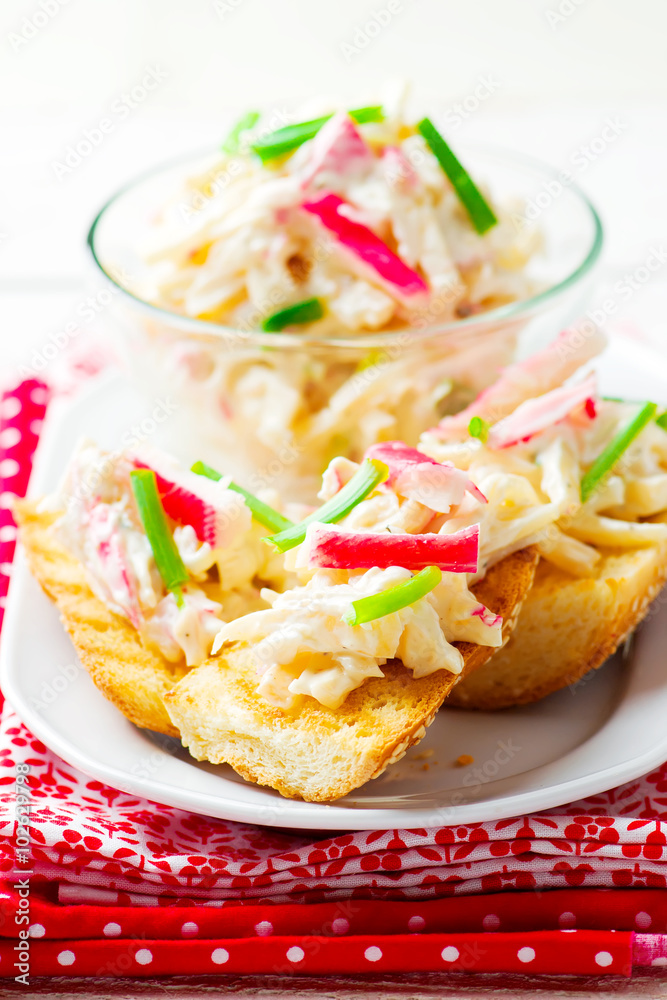 salad from crab sticks on toasts from baguettes salad from crab sticks on toasts from baguettes