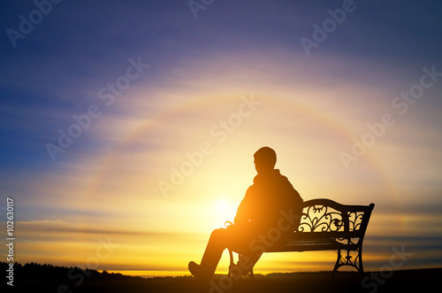 Slika na platnu The lonely man sits on a decline