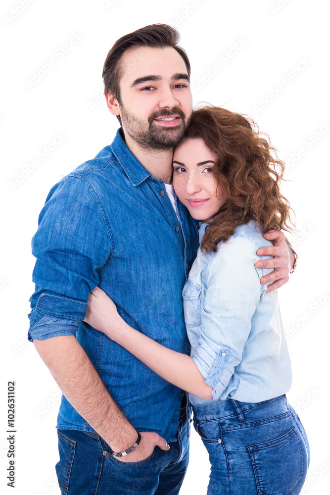 young happy couple embracing isolated on white young happy couple embracing isolated on white