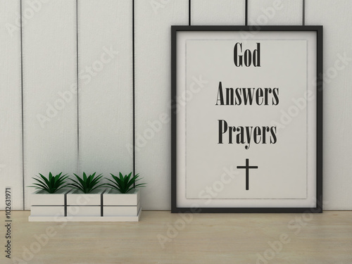 Faith religion concept. God answers Prayers quotation in frame