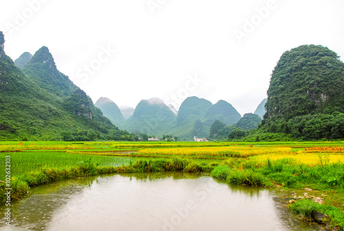 The beautiful mountains and rural scenery in raining, Guilin, China 