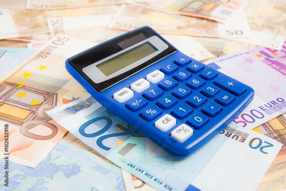 Calculator with Euro notes. Budget Concept. Money and calculat Calculator with Euro notes. Budget Concept. Money and calculat
