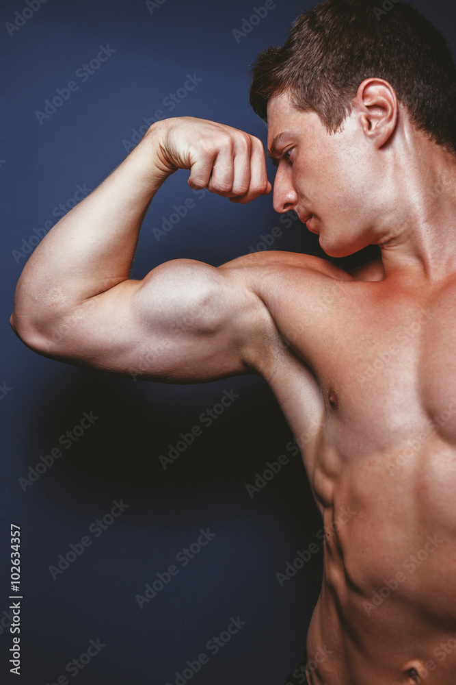 Man showing sports figure Man showing sports figure
