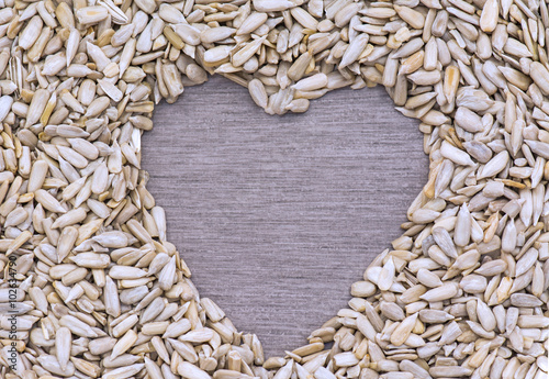 Quadro em tela Sunflower Seeds in heart shape