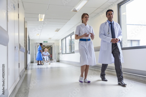 Senior Female Patient in Wheelchair Nurse and Hospital Doctor photo