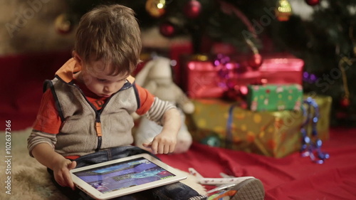 boy got the gift- tablet PC photo