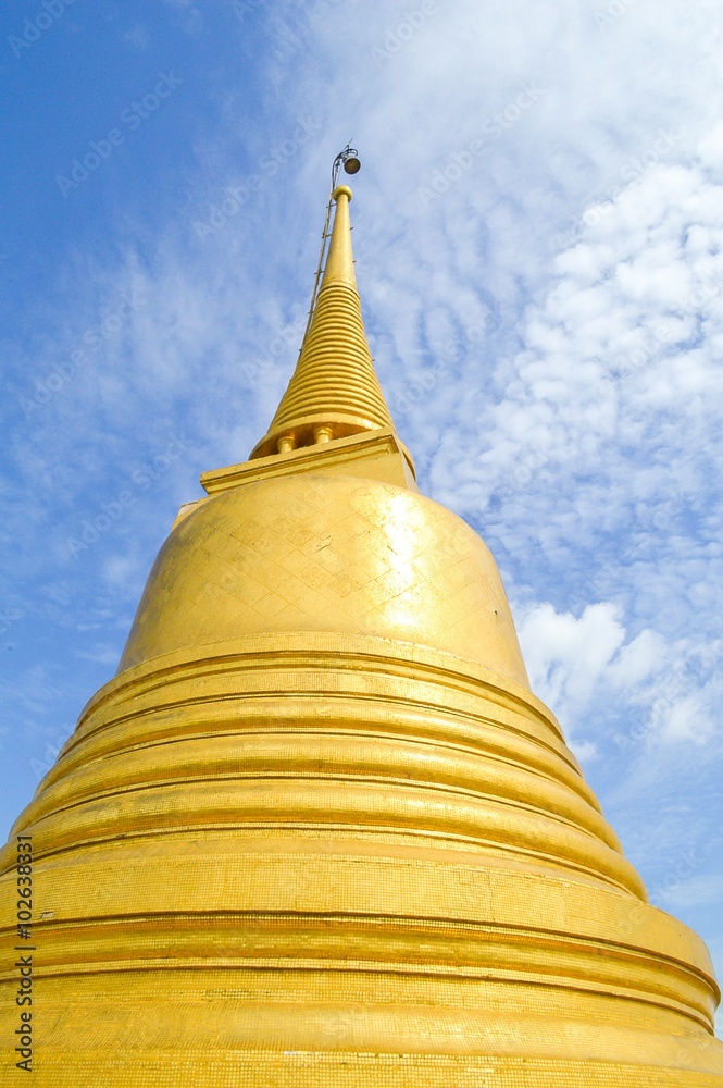 Golden pagoda in Wat Sraket Thailand