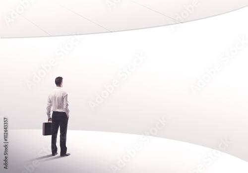 Salesman standing with his back concept