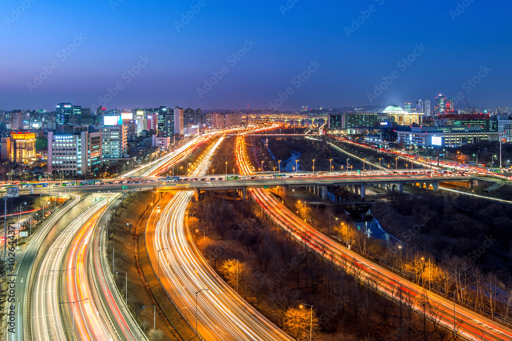 Traffic in Singil district, Seoul Korea skyline at night.