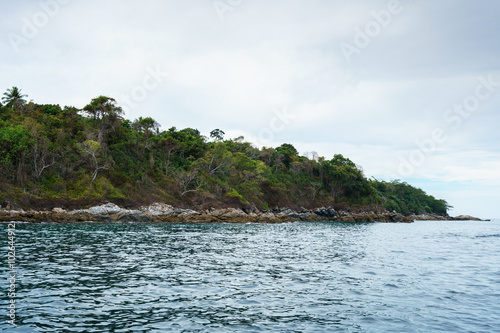 Seascape while boating. View of island coast © Wisky
