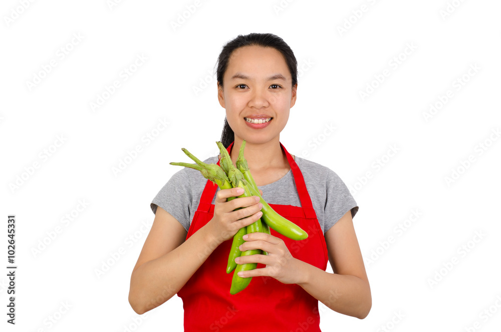 Happy woman holding green eggplant ready to cooking,isolated on white background Happy woman holding green eggplant ready to cooking,isolated on white background