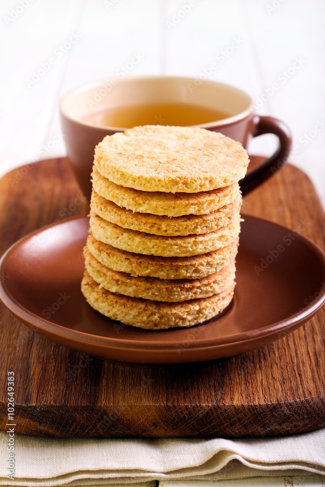Coconut biscuits and cup of tea Coconut biscuits and cup of tea