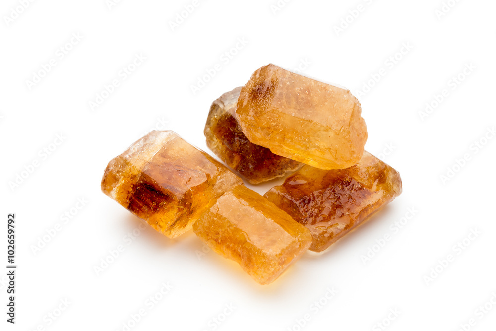 Large caramelized sugar on a white background. Large caramelized sugar on a white background.