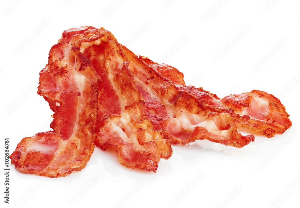 Cooked bacon rashers close-up isolated on a white background. Cooked bacon rashers close-up isolated on a white background.