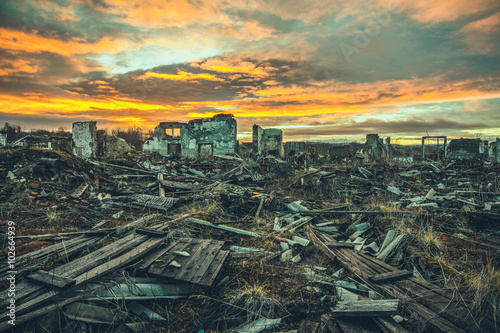 Apocalyptic landscape.The ruins of the destroyed buildings at sunset