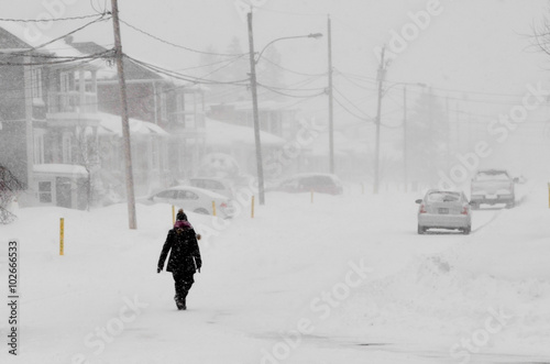 Women walking in the snow storm
