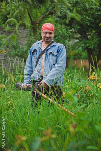gardener with lawn mower