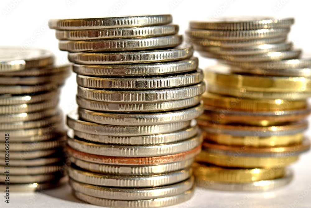 Coins stacked in bars. The concept of revenue growth Coins stacked in bars. The concept of revenue growth