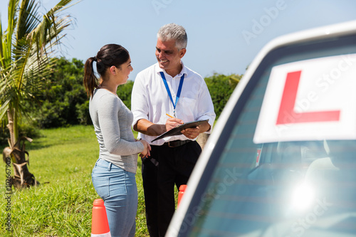 female learner driver and instructor