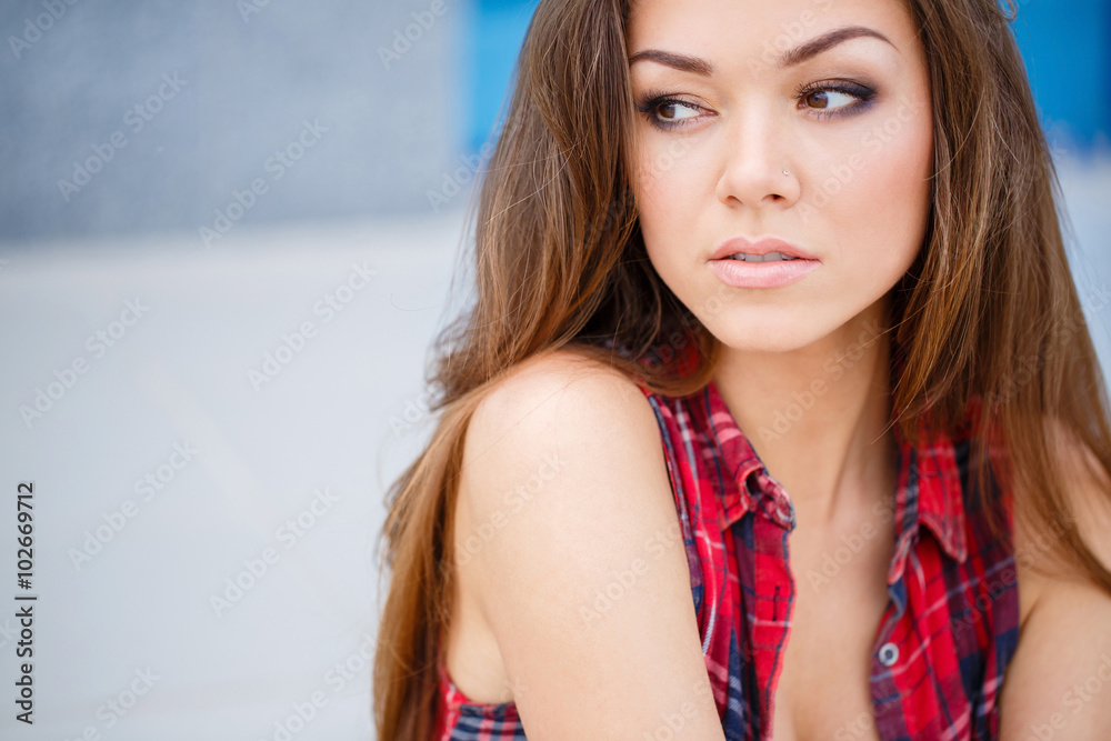 A young woman with a beautiful smile,a portrait outdoors A young woman with a beautiful smile,a portrait outdoors