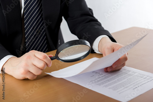 Hands signing business documents. Signing papers. Lawyer, realto