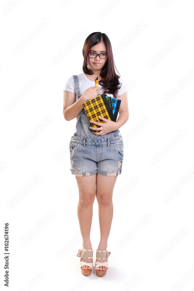 Disappointed school girl, full body isolated Disappointed school girl, full body isolated